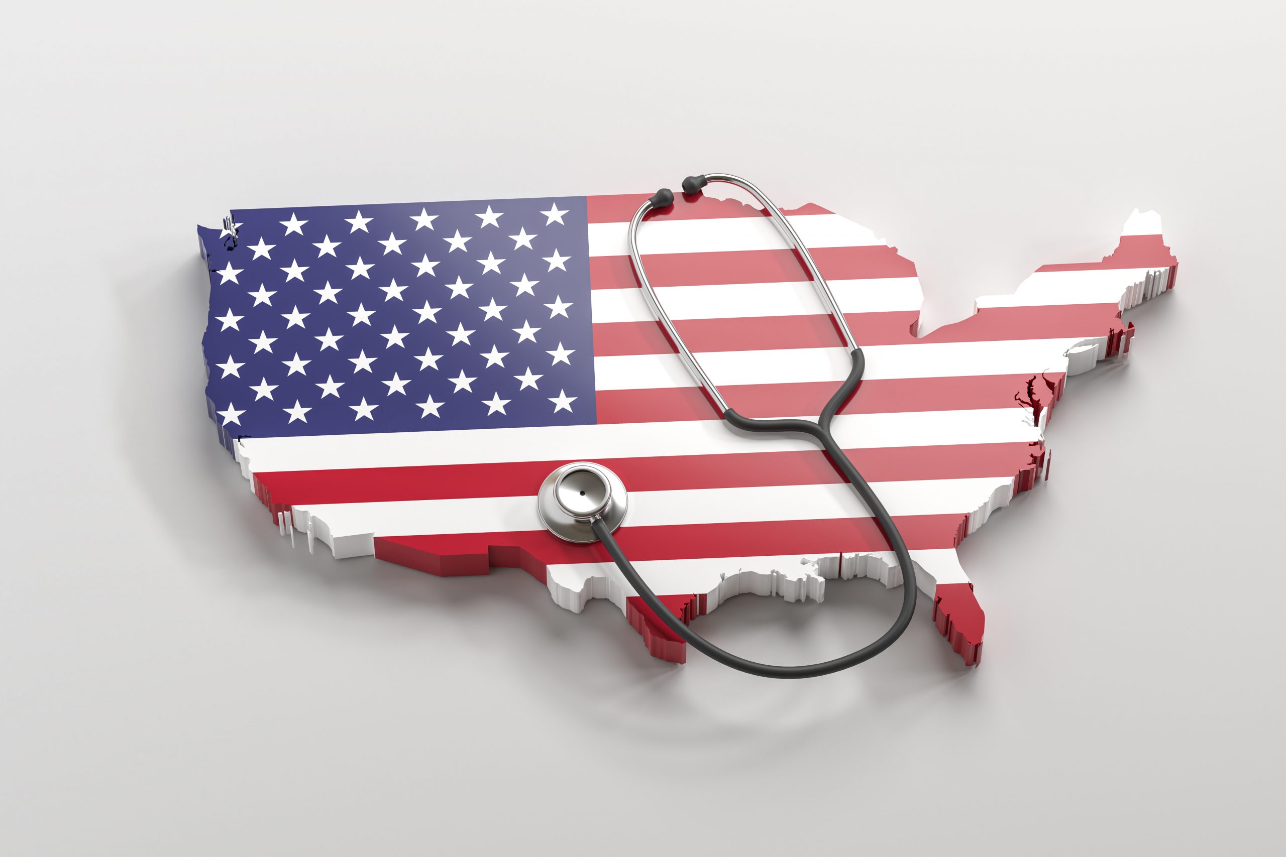 Healthcare in the United States of America concept: A stethoscope on a 3d map of the US overlayed by the US flag.